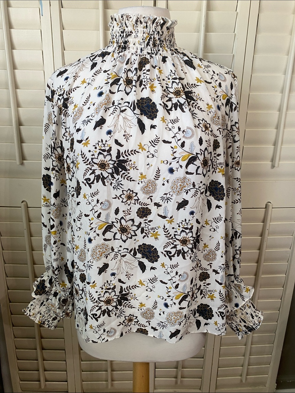 Violet & Claire White Smocked-Neck Floral Blouse with Black & Gold Accents